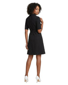 Woman wearing a black dress on a white background