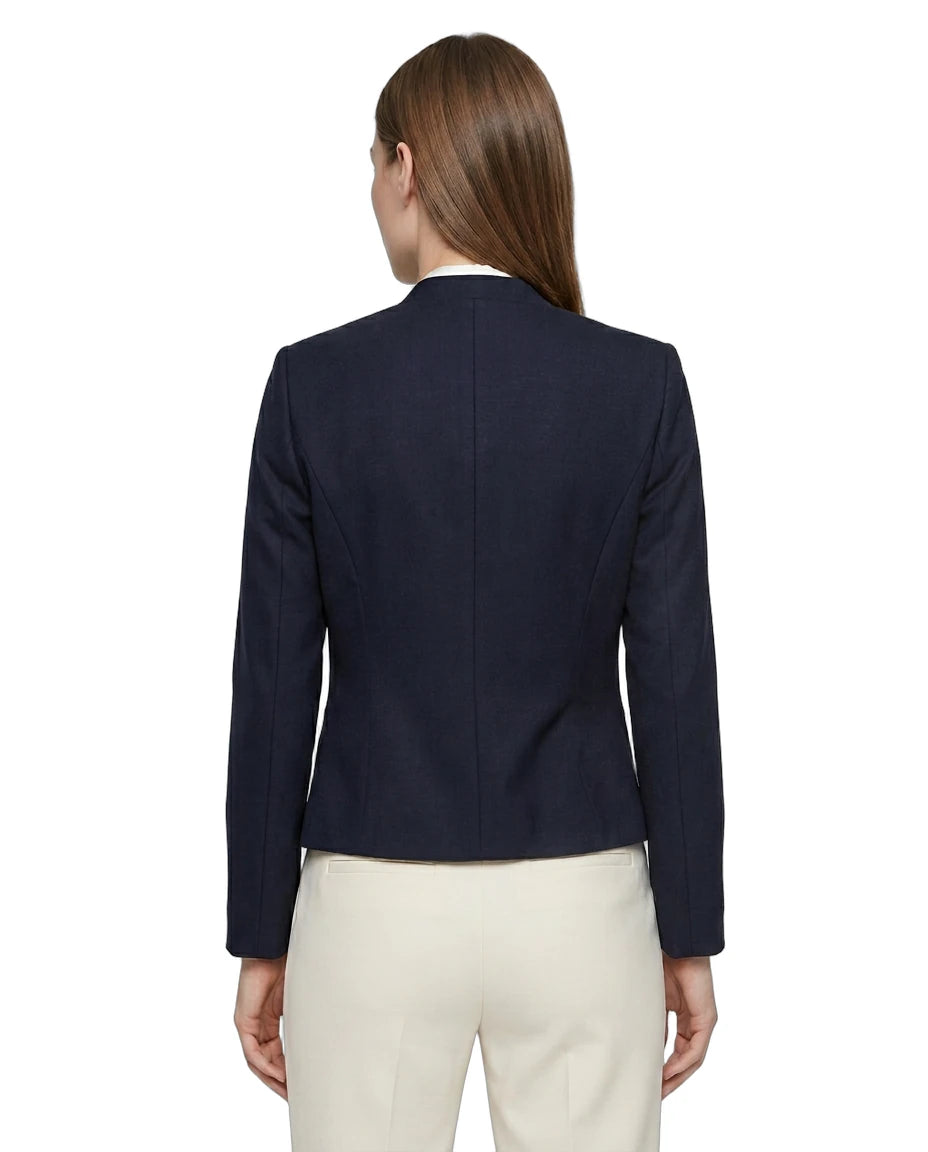 Navy  Calvin Klein blazer worn by a person on a white background