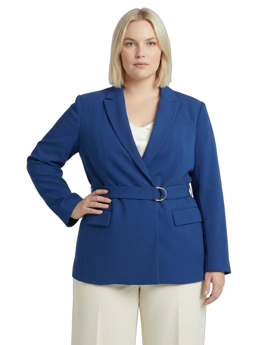 Woman wearing a blue Calvin Klein blazer with a white background