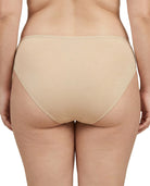 Beige underwear worn by a person on a white background