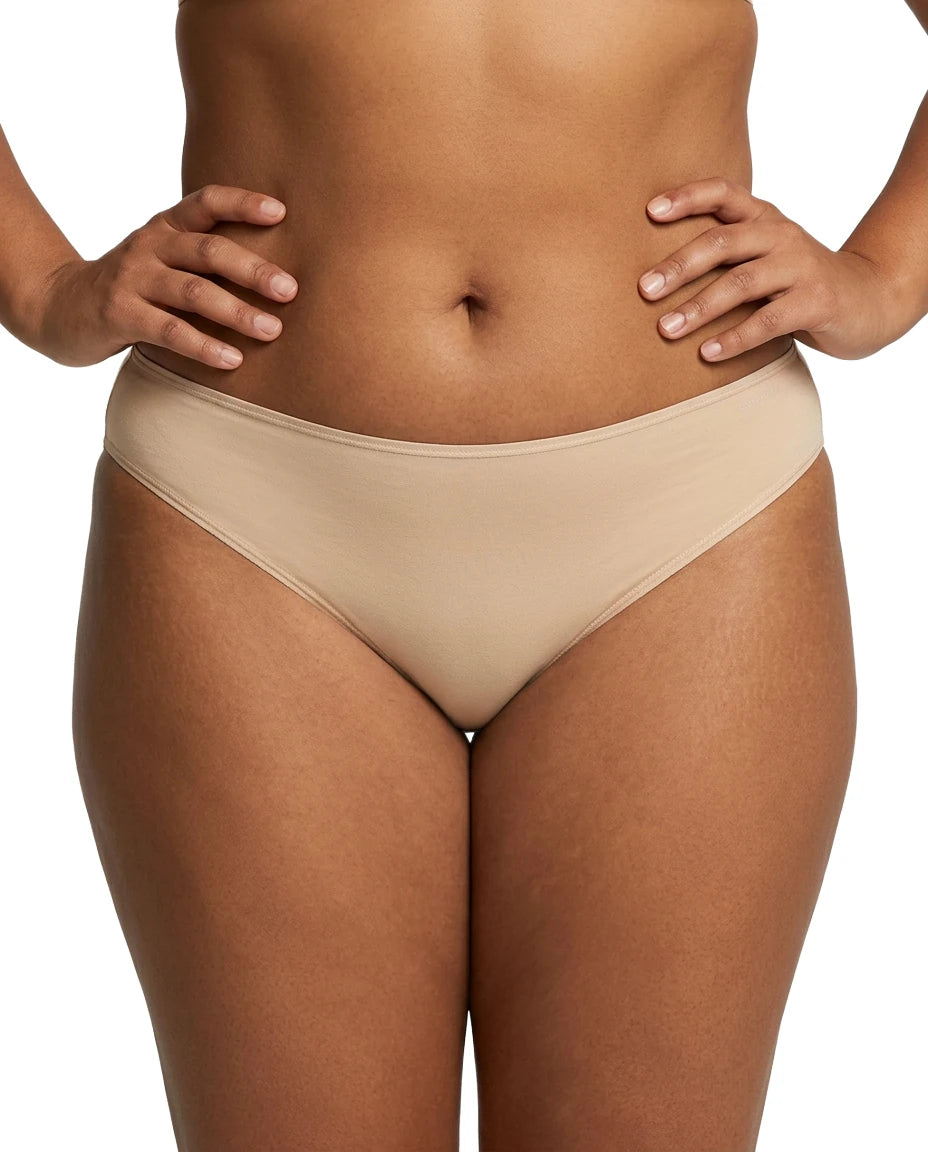Beige underwear worn by a person on a white background