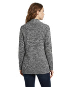 Woman wearing a gray marled cardigan on a white background