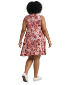 Woman wearing a floral dress on a white background