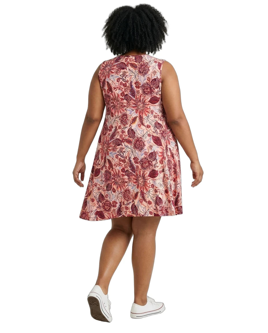 Woman wearing a floral dress on a white background